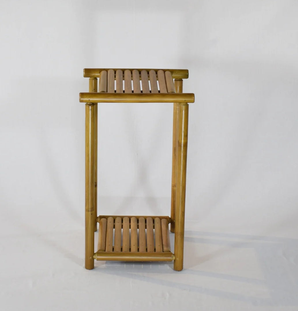 Pot stand Bamboo-Dual layer pot stand made from finely finished bamboo strips. Perfect for homes, offices and other commercial spaces having an earthy touch. The planter stands are eye-catching, modern, and minimalistic, available predominantl