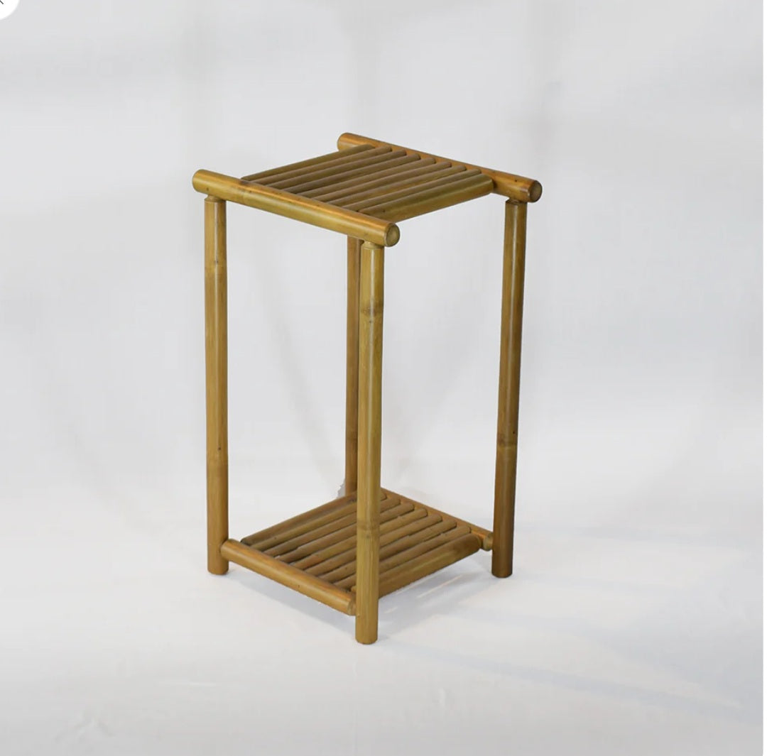 Pot stand Bamboo-Dual layer pot stand made from finely finished bamboo strips. Perfect for homes, offices and other commercial spaces having an earthy touch. The planter stands are eye-catching, modern, and minimalistic, available predominantl