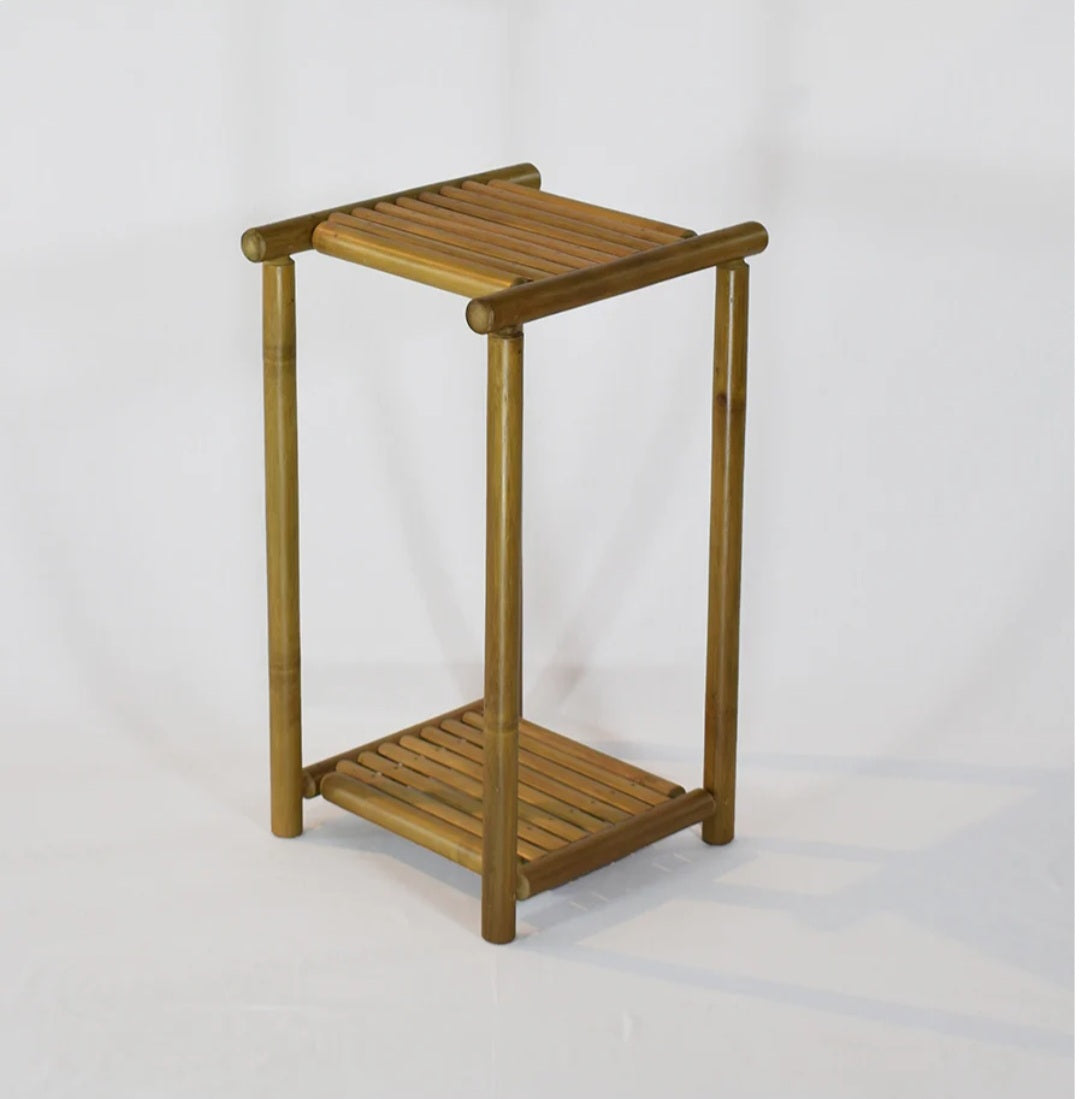 Pot stand Bamboo-Dual layer pot stand made from finely finished bamboo strips. Perfect for homes, offices and other commercial spaces having an earthy touch. The planter stands are eye-catching, modern, and minimalistic, available predominantl