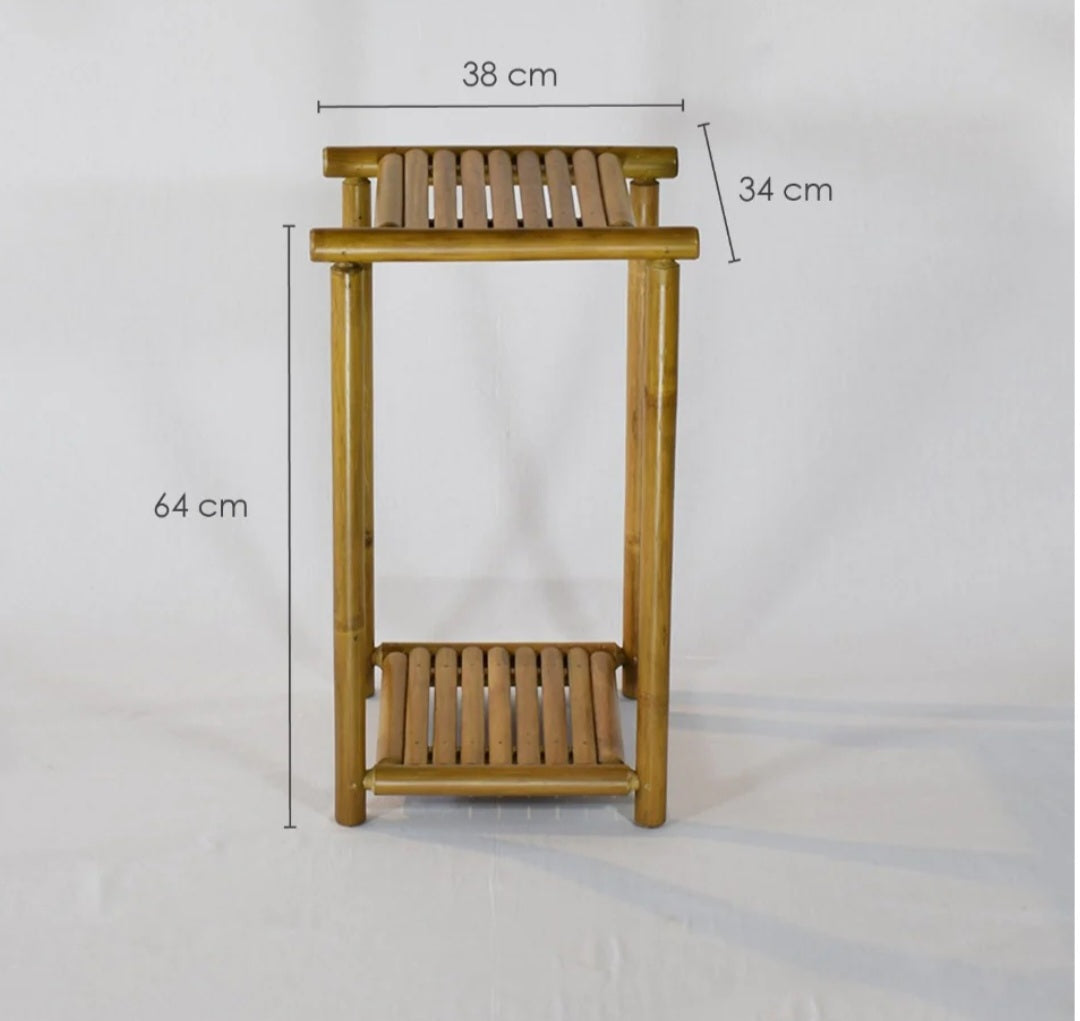 Pot stand Bamboo-Dual layer pot stand made from finely finished bamboo strips. Perfect for homes, offices and other commercial spaces having an earthy touch. The planter stands are eye-catching, modern, and minimalistic, available predominantl